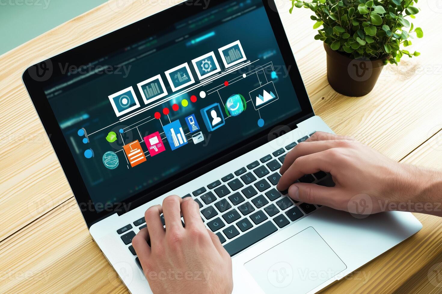 Businessman works on a sleek laptop creating a flow chart photo