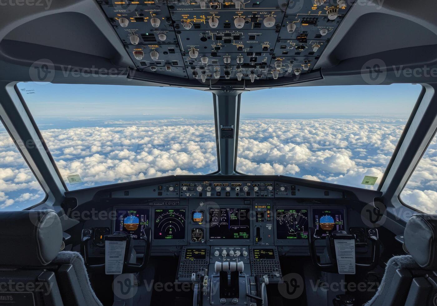 Dramatic view from an airplane cockpit, showcasing fluffy clouds stretching to the horizon. photo