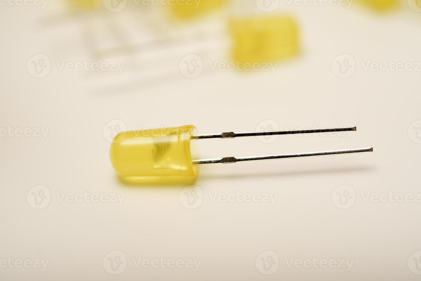 One yellow LED element. Electronic LED lamp. LED illumination unit photo