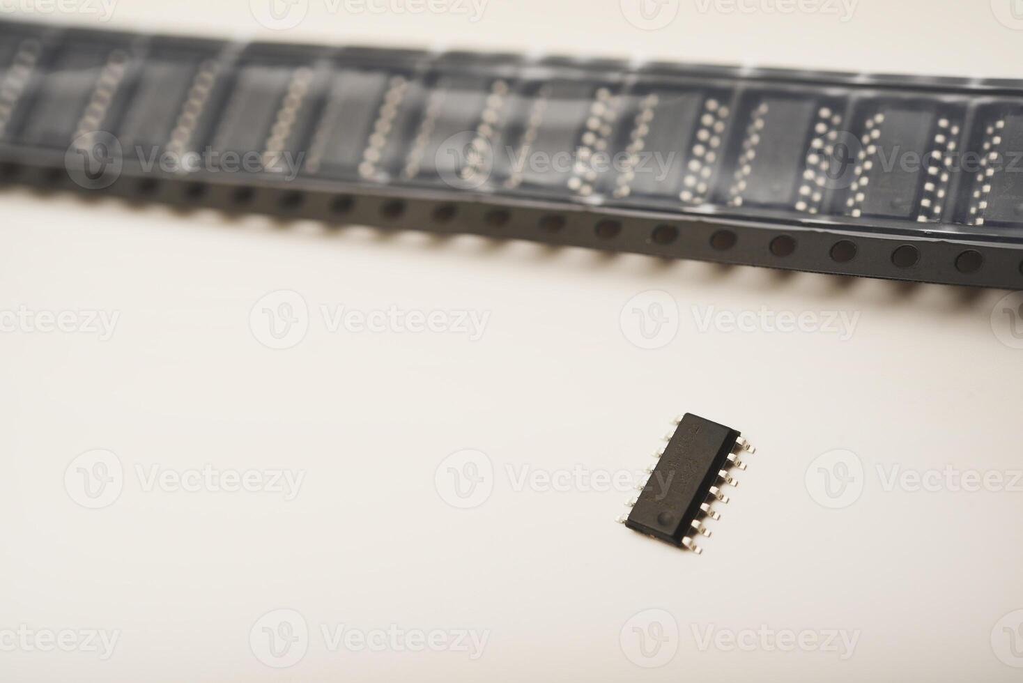 The circuit board is covered in packaging tape. photo