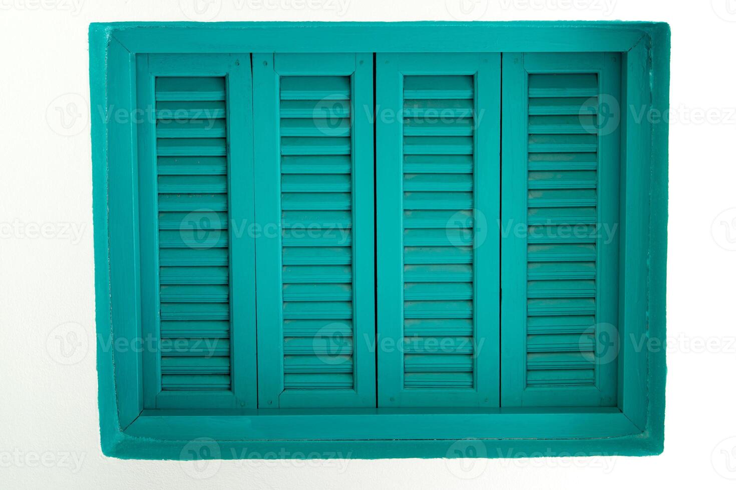 The Blue wooden windows that are sealed on white walls photo
