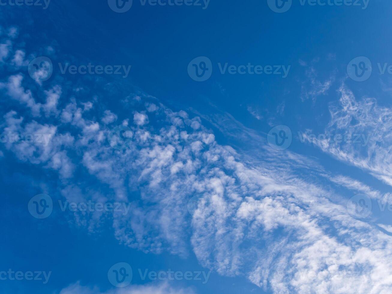 White clouds in the blue sky photo