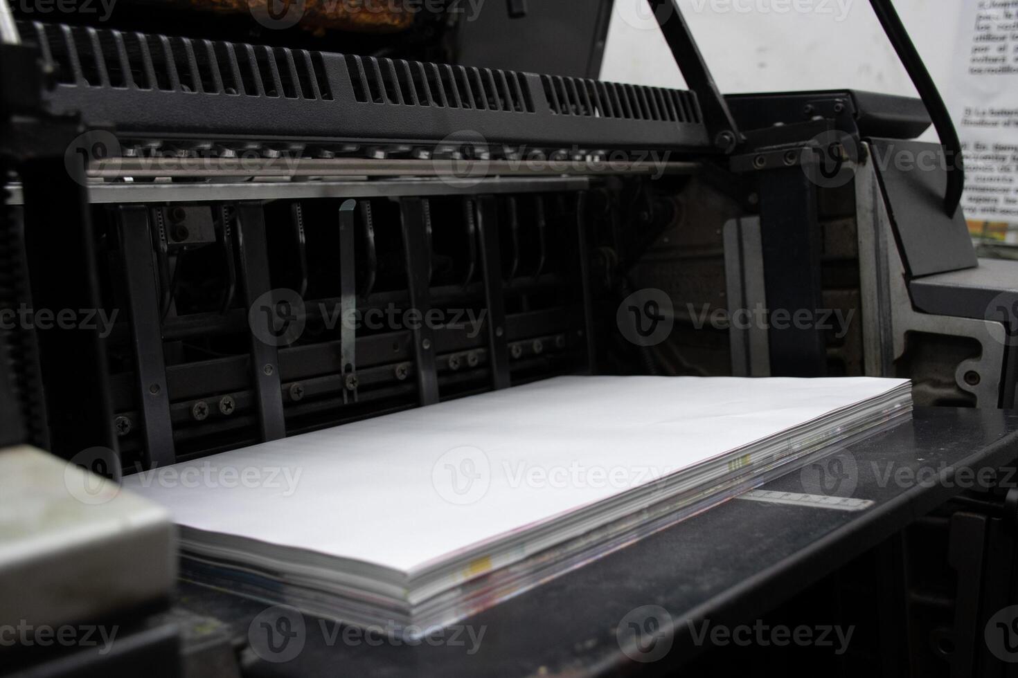 Paper in Industrial Printer High Speed Printing Process. High quality photo