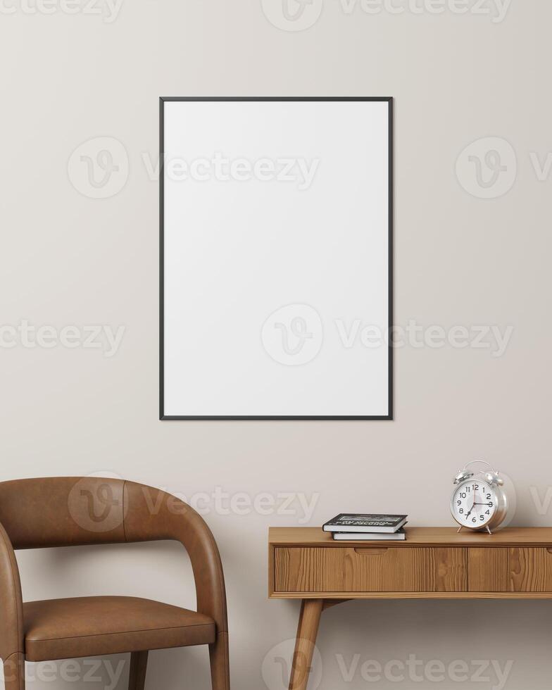 Modern desk setup with a black photo frame, brown chair, wooden table, books, and clock for showcasing artwork or photography.