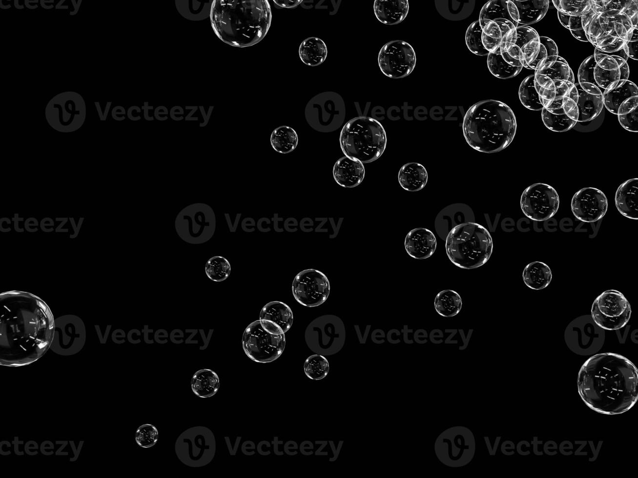 Clear bubbles in motion on a dark black backdrop. photo