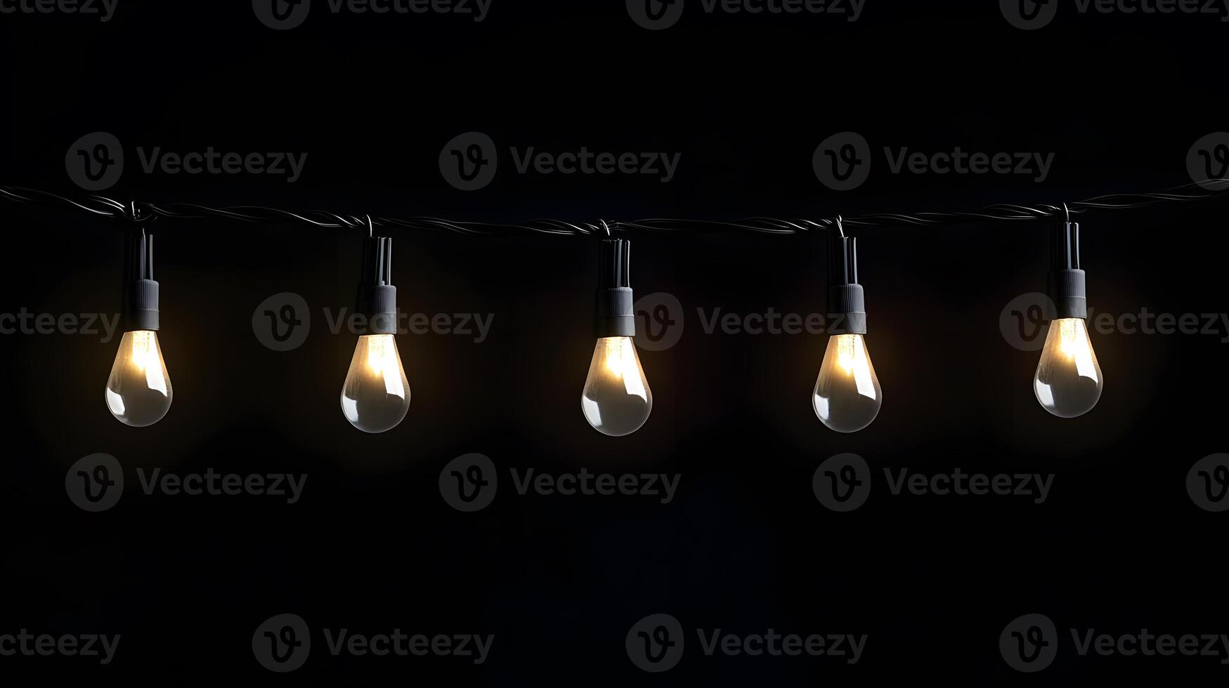 A string of lights with bulbs hanging from it photo