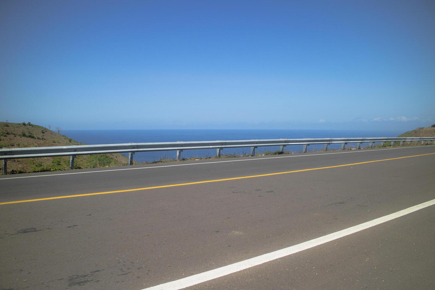 THE EMPTY ROAD AND AN OCEAN HORIZON photo