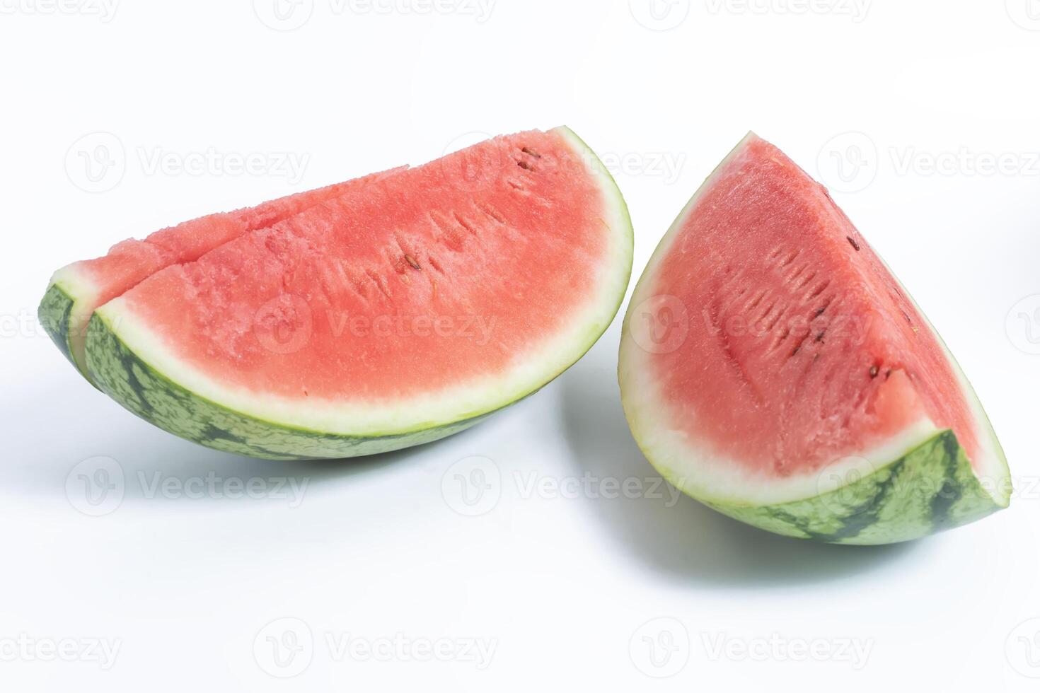 Fresh watermelon slices on a white background, close-up view. photo