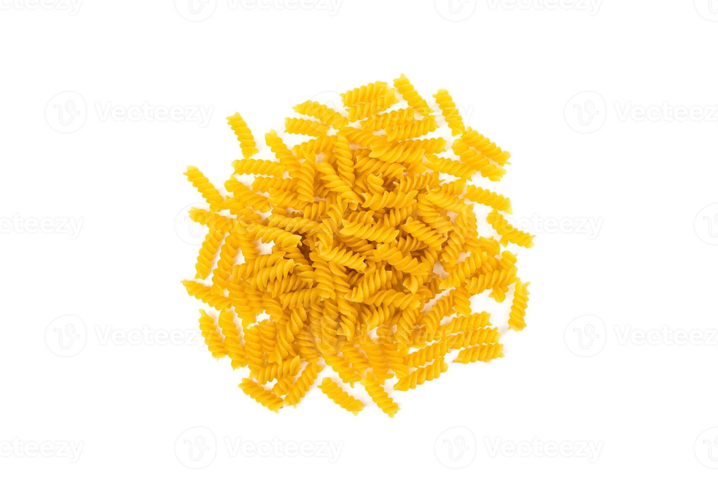 Fusilli paste spiral shape isolated on a white background. Top view. Selective focus. photo