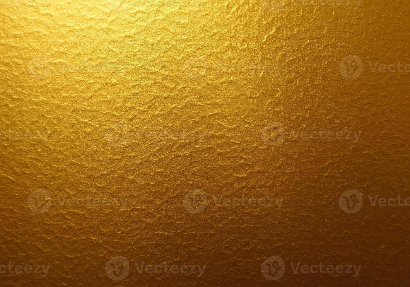 A textured golden surface with a rough, aged pattern photo