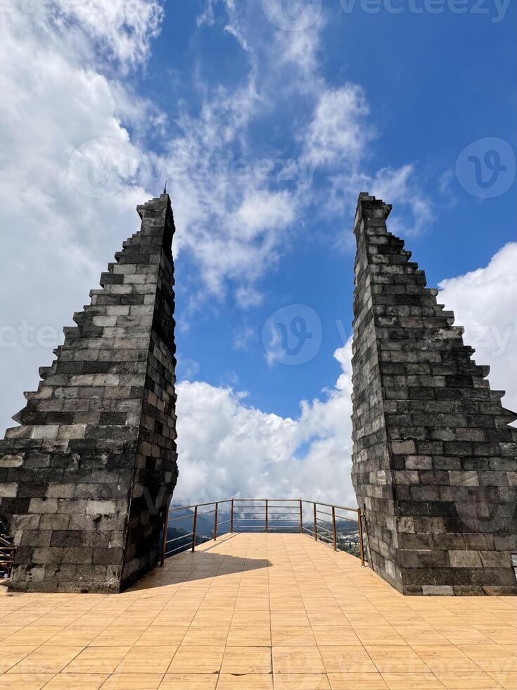 Ancient Stone Towers Under Blue Sky. Seruni Point Bromo photo