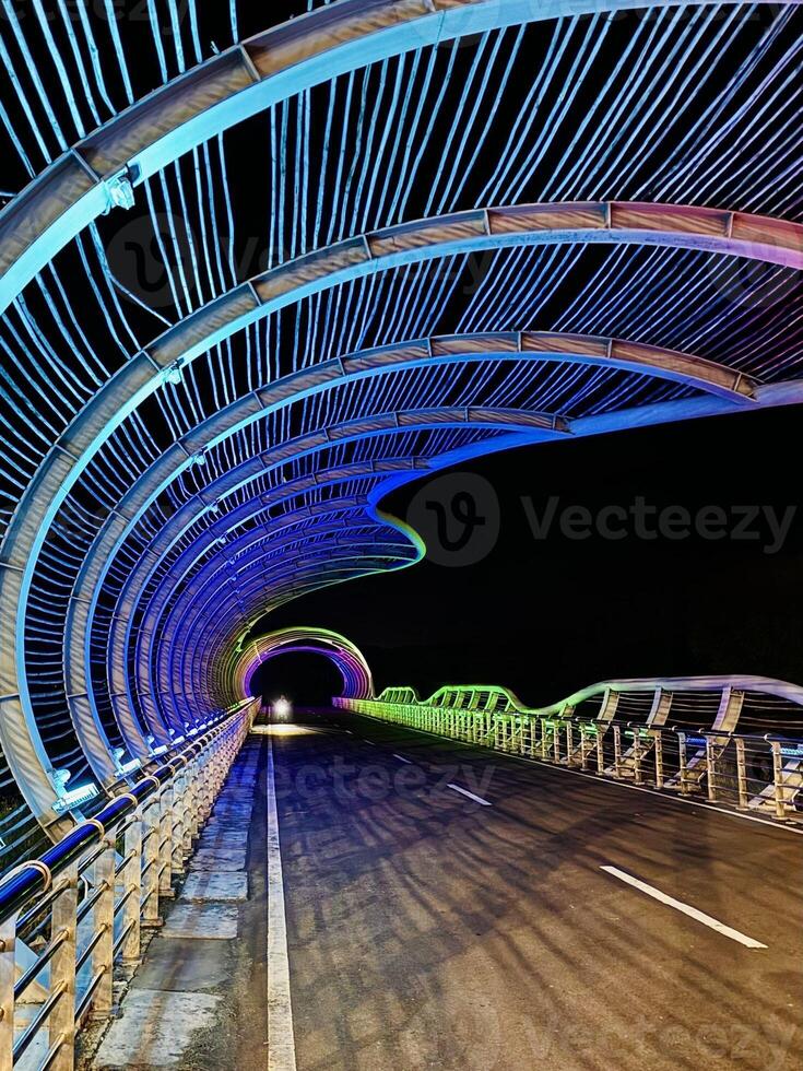 Colorful LED-Lit Bridge at Night photo