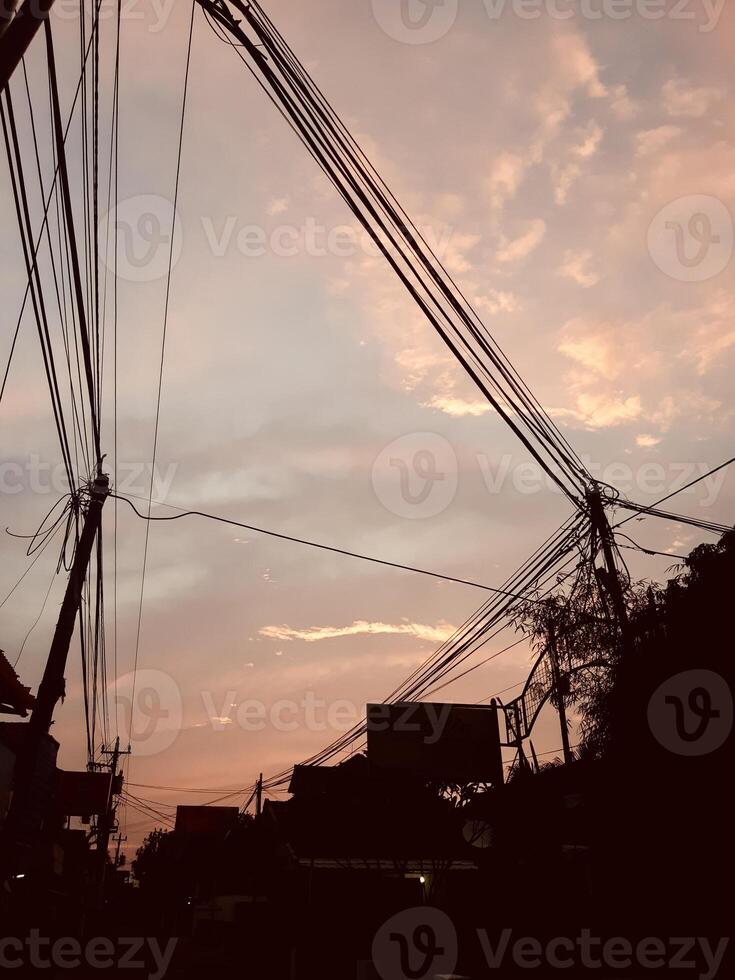 Power Lines Silhouette at Sunset photo