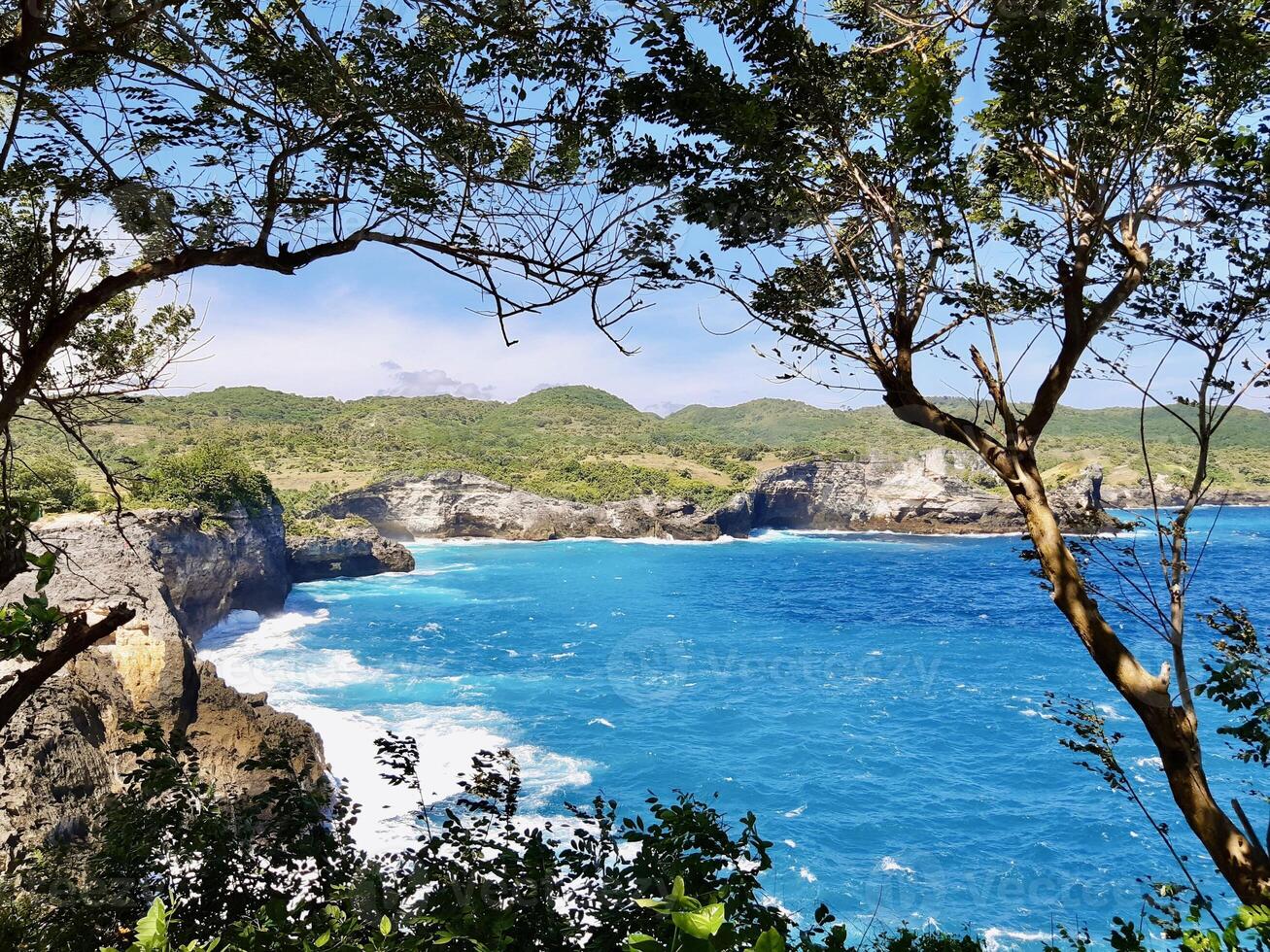 Scenic Coastal View with Turquoise Ocean and Cliffs. Angels Bilabong Nusa Penida Bali. photo