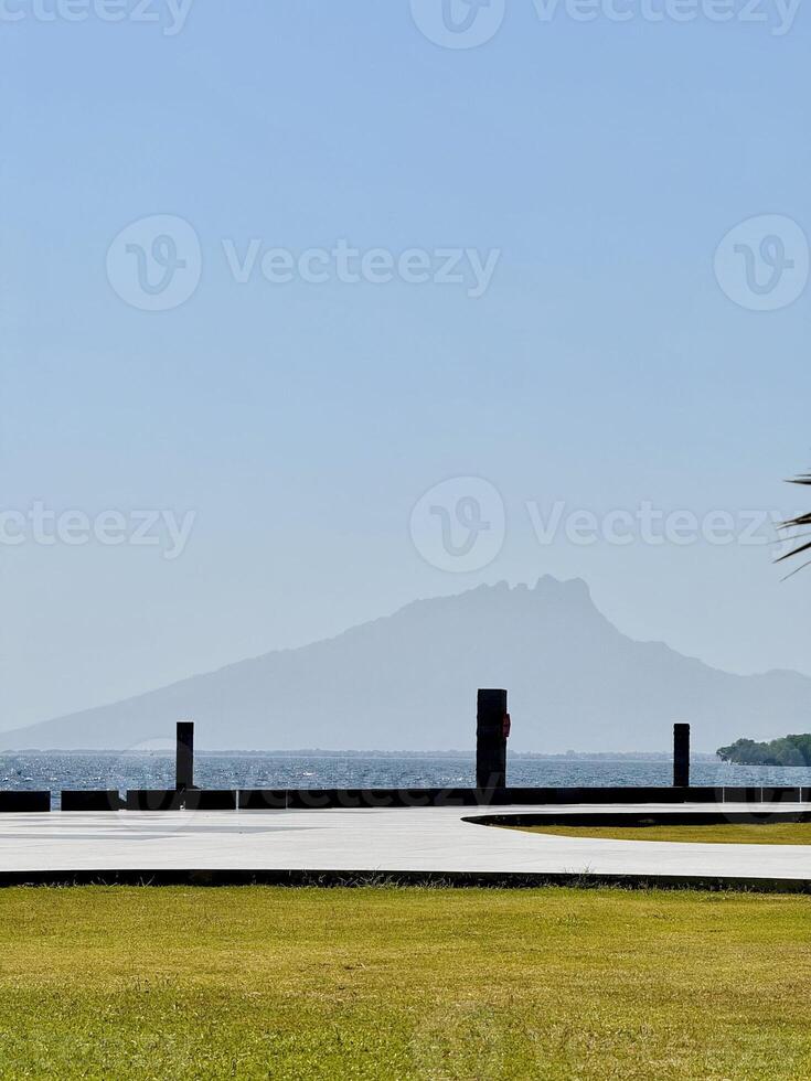 Serene Mountain Landscape with Clear Sky. Capture from Utama Raya Situbondo photo