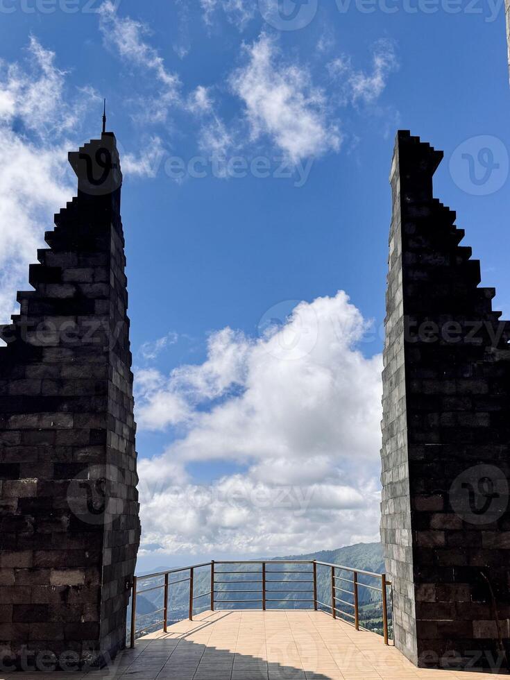 Scenic View from Stone Towers Against Blue Sky. Seruni Point Bromo photo