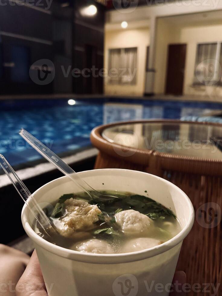 Nighttime Poolside Dining with Soup photo