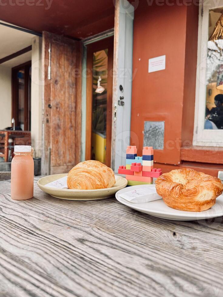 Cozy Cafe Scene with Pastries and Colorful Blocks photo