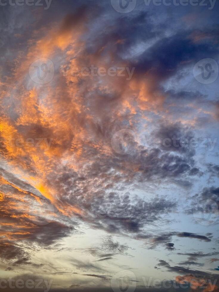Dramatic Fiery Sunset Sky with Vibrant Clouds photo