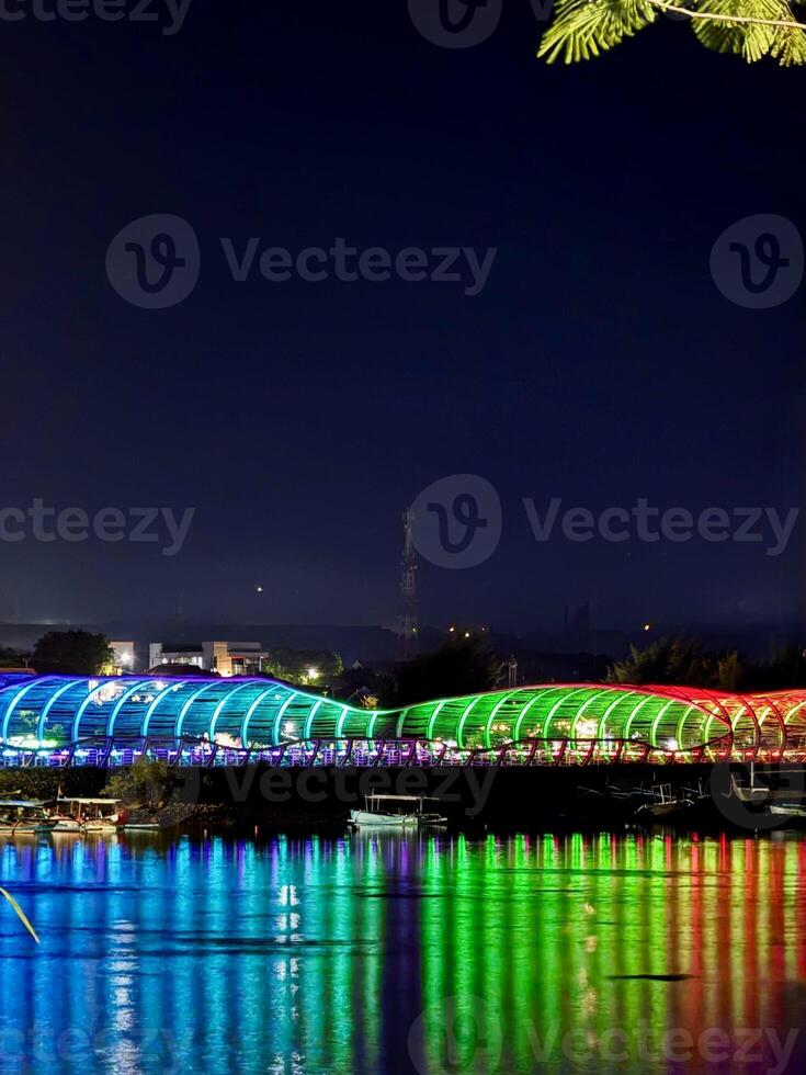 Colorful Illuminated Pedestrian Bridge at Night photo