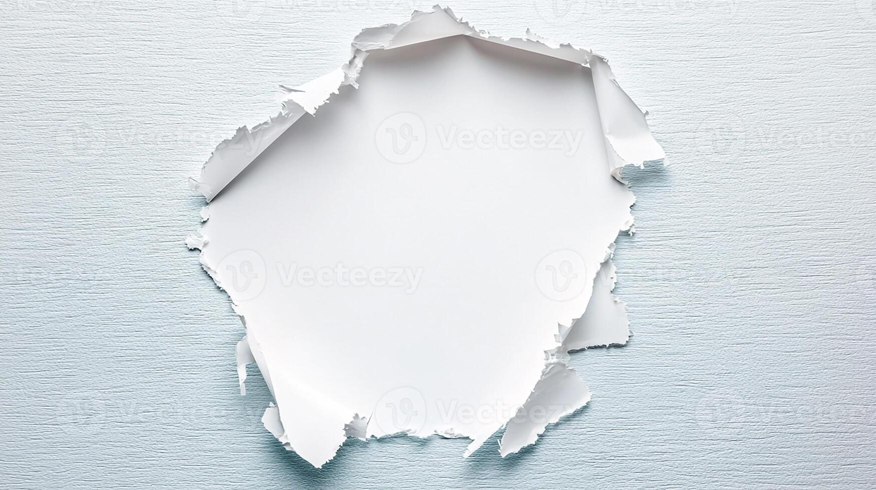 Ripped Paper Hole on Textured Background photo
