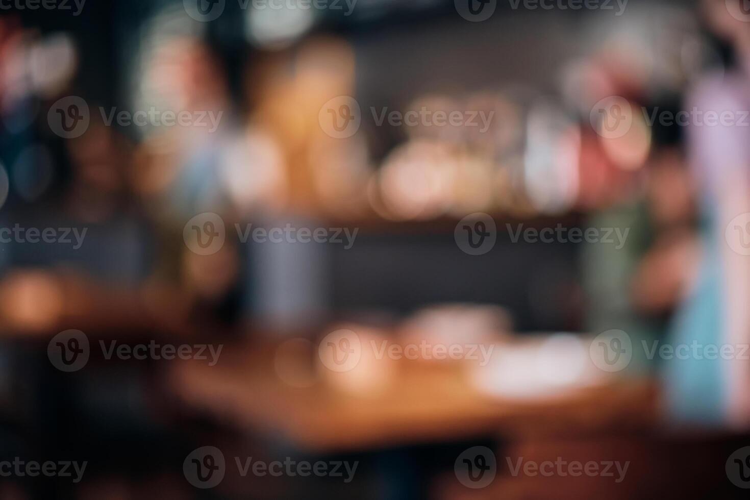 Coffee shop blur background with bokeh lights. Blurred outlines of bar and tables, dim lights photo