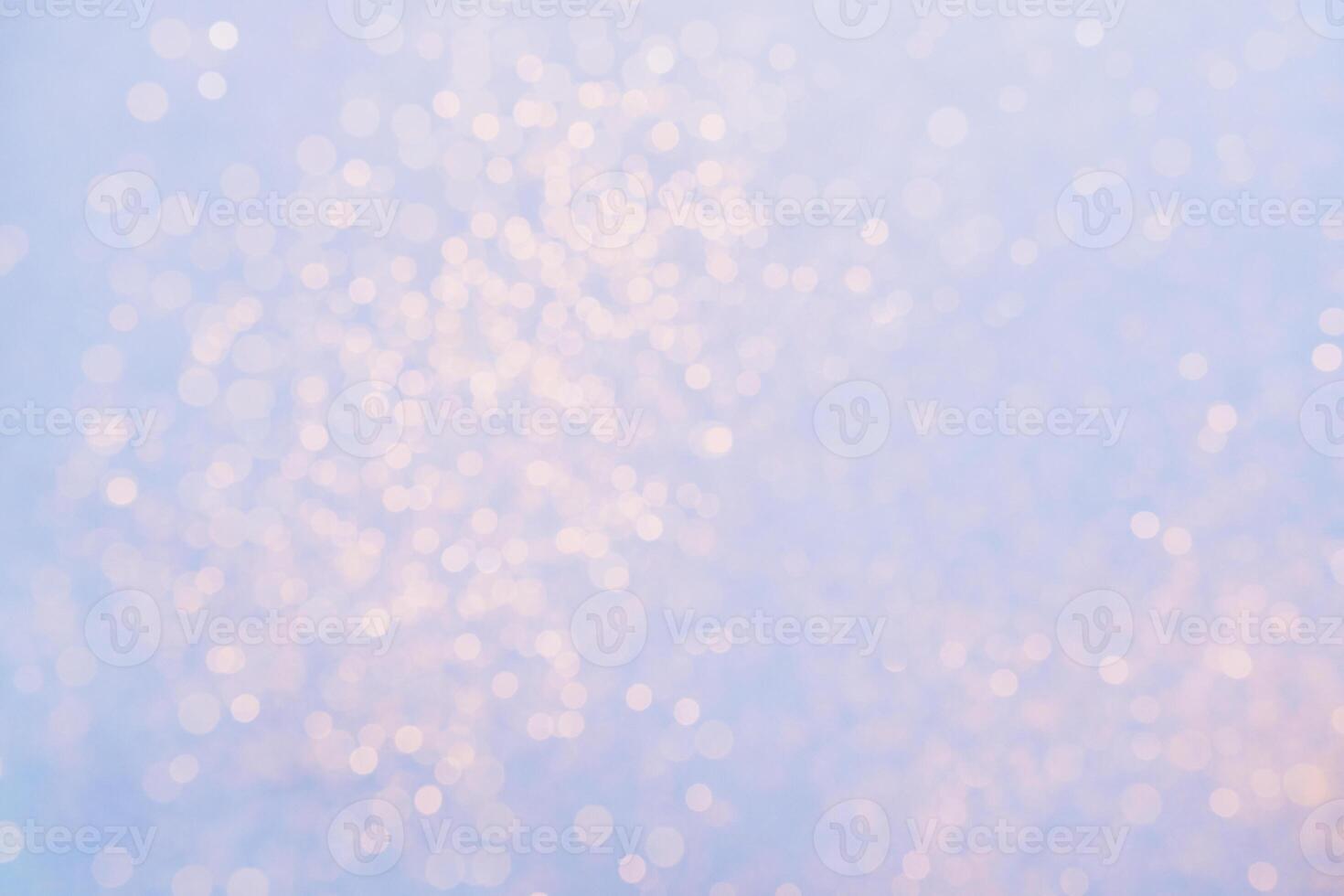 Festive Blue background of golden glitter lights. Winter blurred abstraction photo