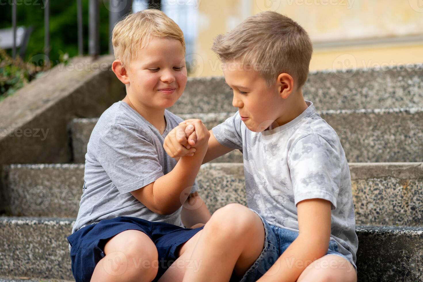 View of two boys playing and having fun together photo
