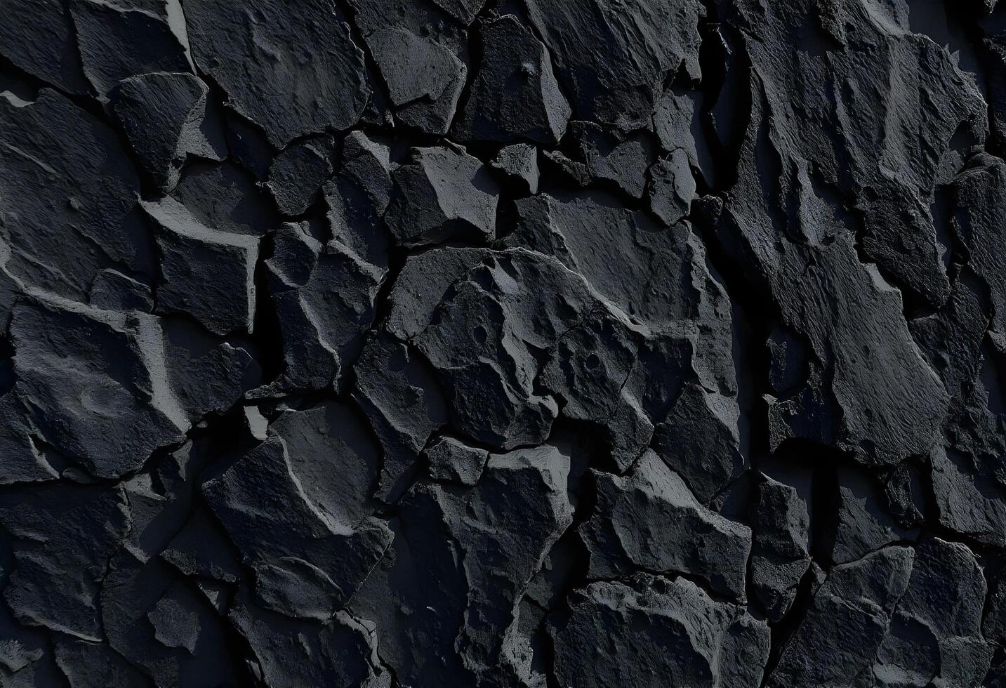 Close-up view of a black rock face photo