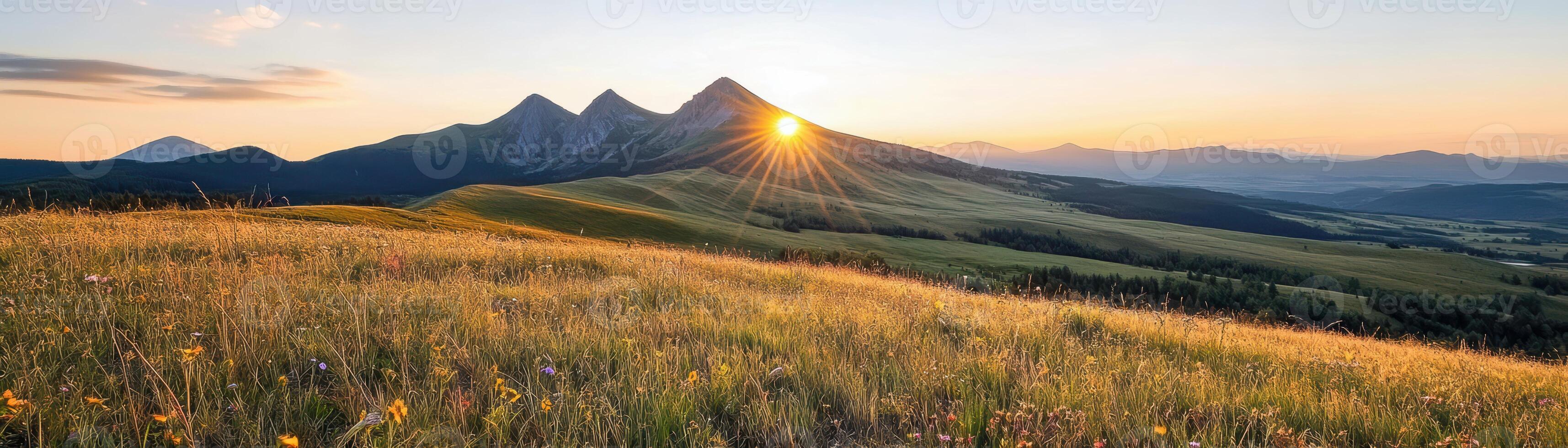 basking in warm glow of an idyllic landscape, tranquil sunset panorama over vibrant green meadows and wildflowers, with ray of sunlight kissing azure sky and illuminating majestic mountainside photo