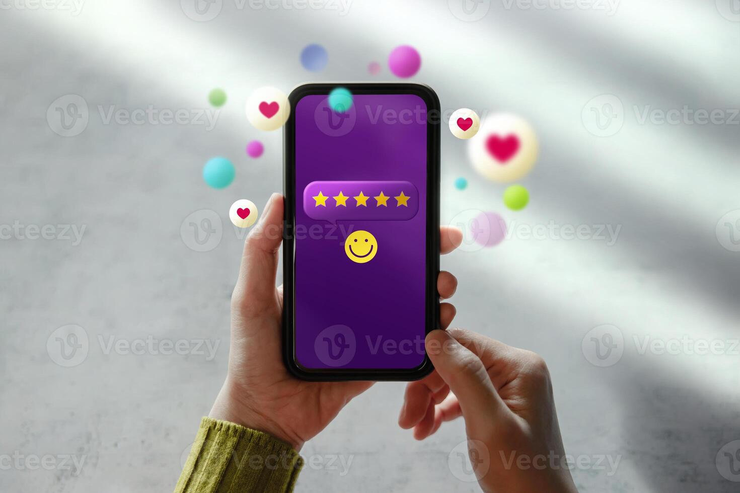 Customer Experiences Concept. Happy Client Using Smartphone to Giving Five Stars Review Rating via Online Satisfaction Surveys. Positive Feedback on Mobile Phone photo