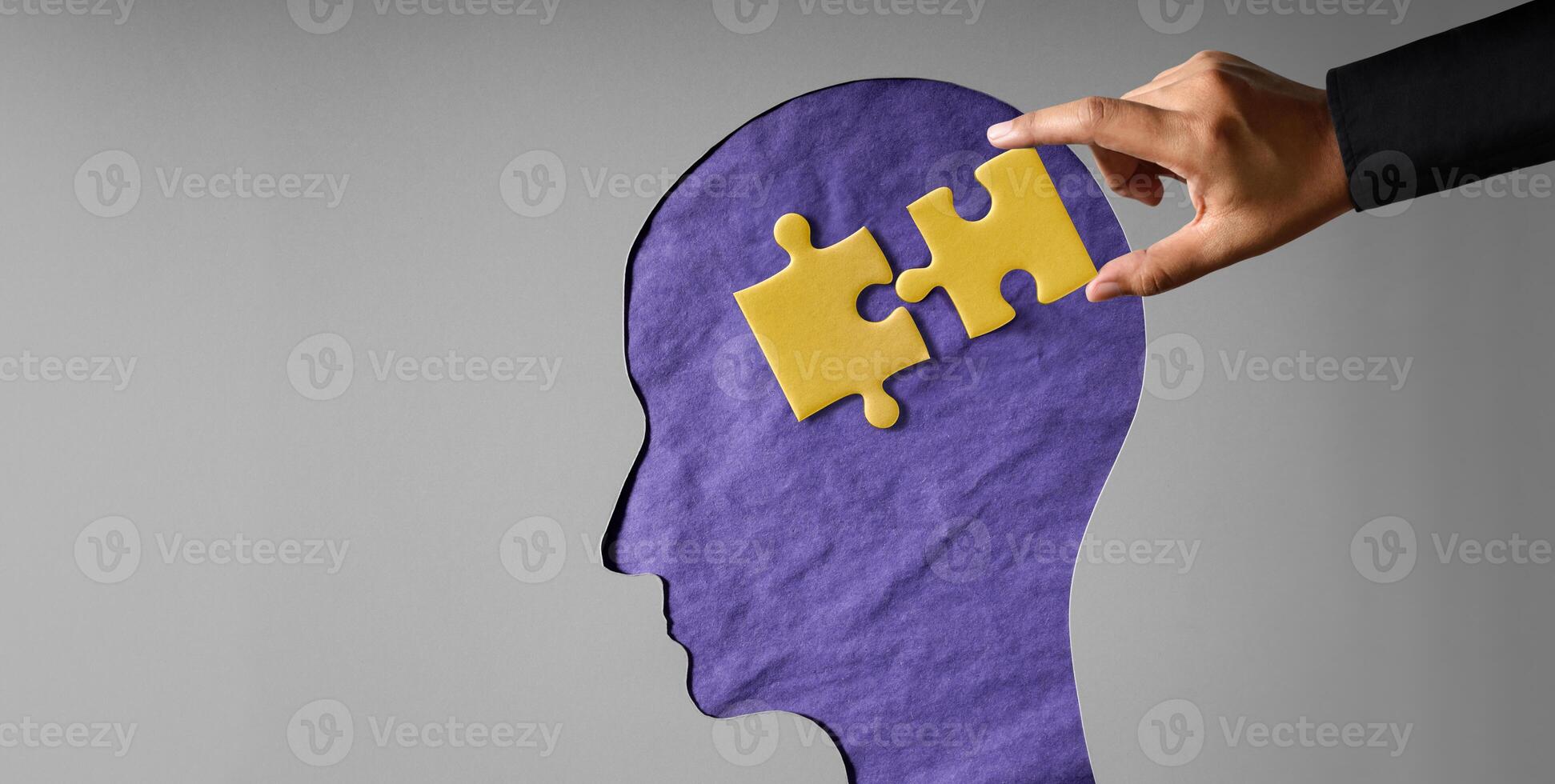 World Autism Day Concepts. hand put the Gold Jigsaw Puzzle inside the Brain. Autism Awareness Day. Neurodiversity, Inclusivity, and Acceptance. photo