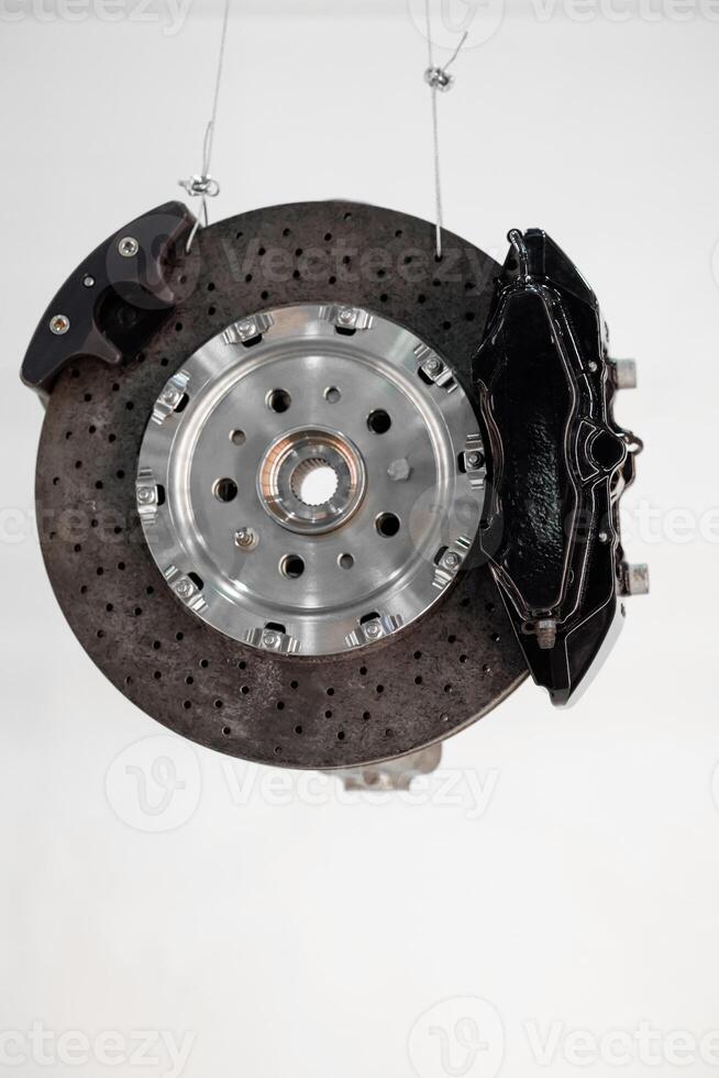 Brake discs and brake pads isolated on white background. Auto parts. Brake disc photo