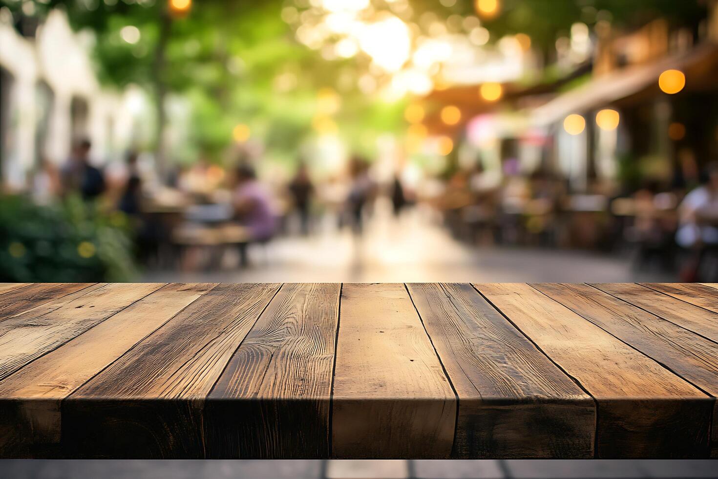 Wooden table in outdoor cafe setting with blurred background photo