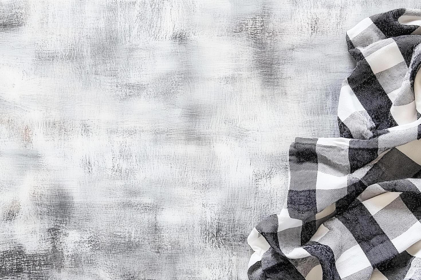 Rustic Wooden Background with Black and White Checkered Tablecloth for Display and Decor photo