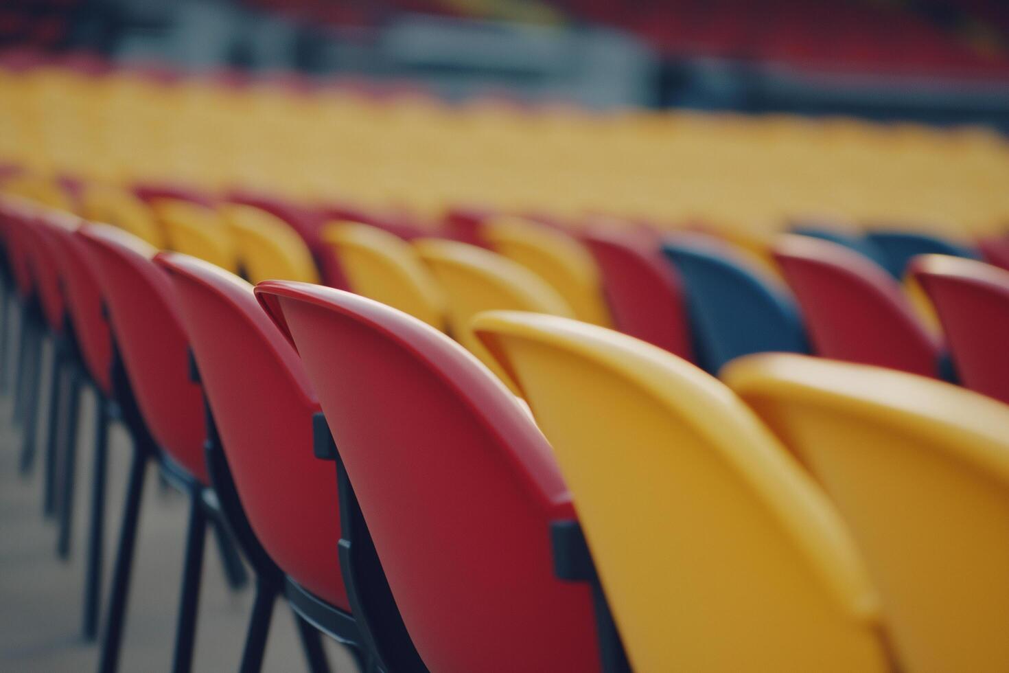 Colorful Plastic Seats Arranged in Rows at a Modern Stadium Arena Ready for Spectators photo