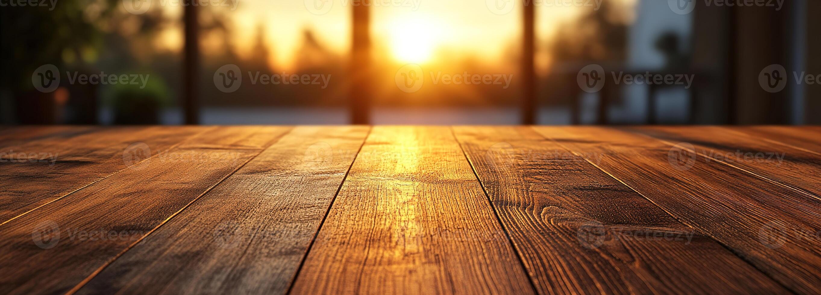 Warm Wooden Table Surface with Sunlight Streaming Through Windows Creating a Cozy Atmosphere in a Modern Interior Setting at Sunrise photo