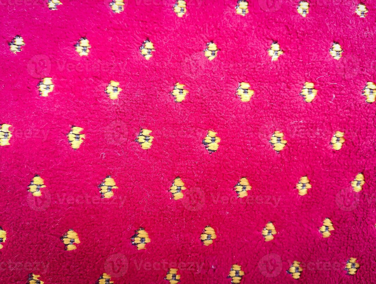 Yellow Dotted Soft Red Carpet Texture Background photo