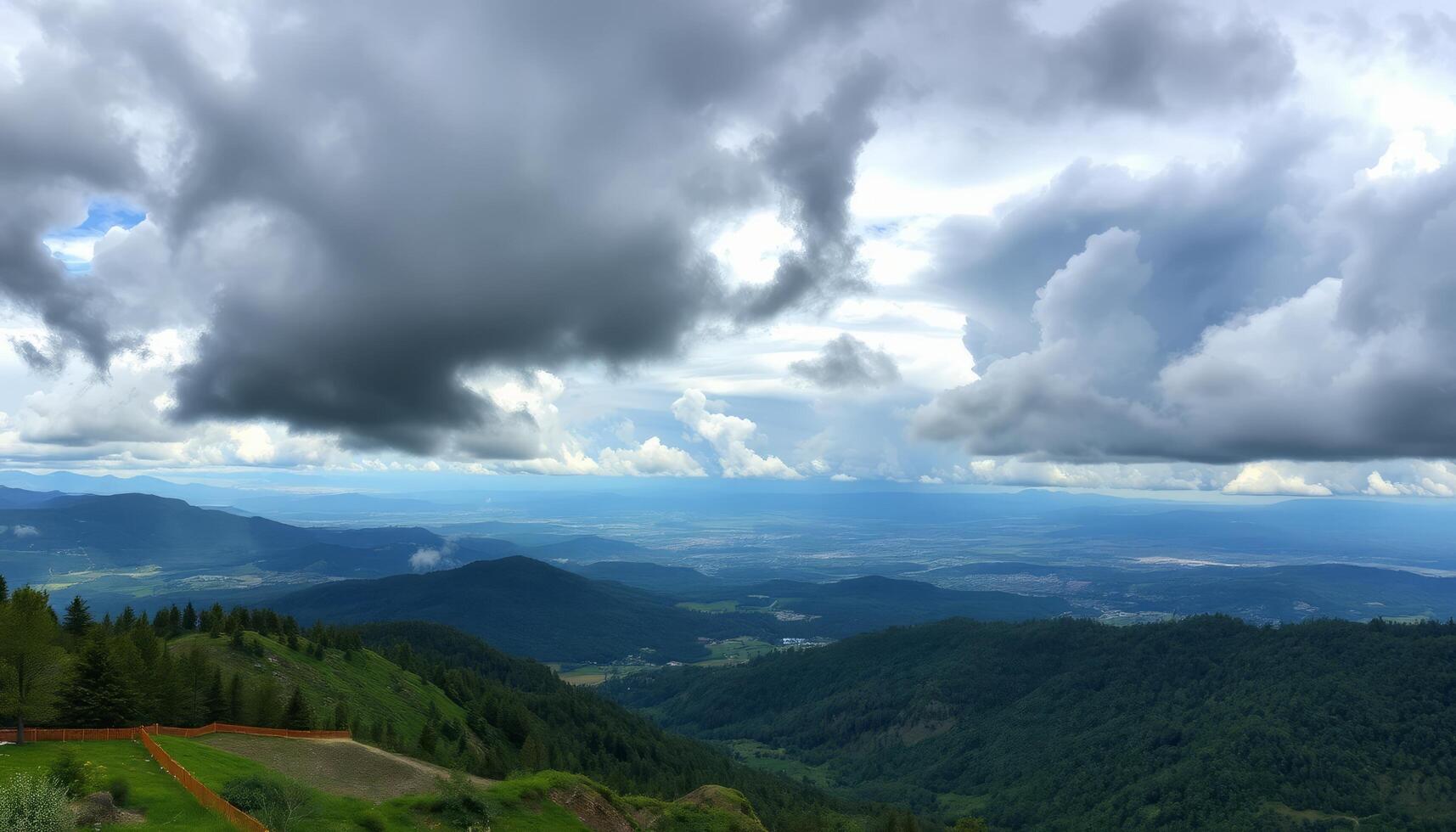 Panoramic Cityscape View from Mountaintop under Dramatic Clouds photo