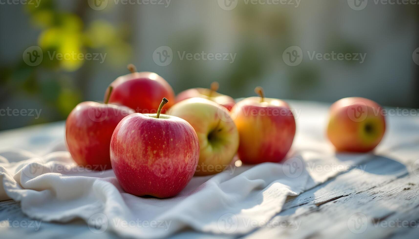 Apples on a cloth on a table photo