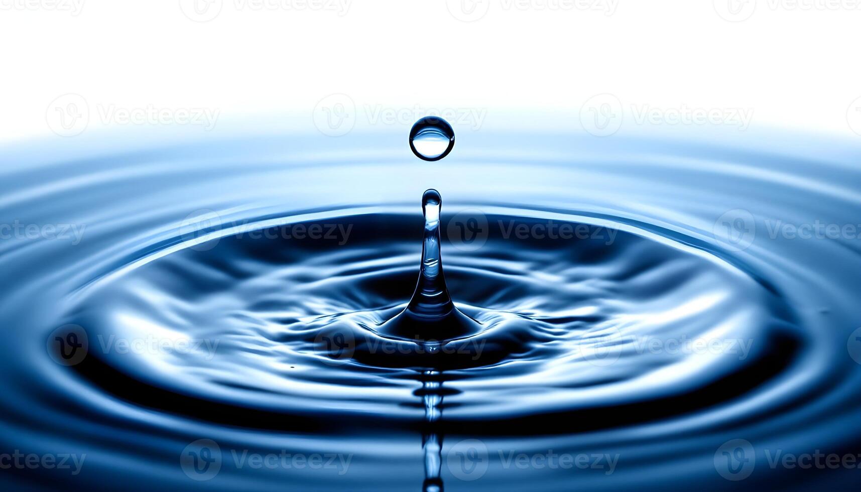 Water drop with ripple effect photo