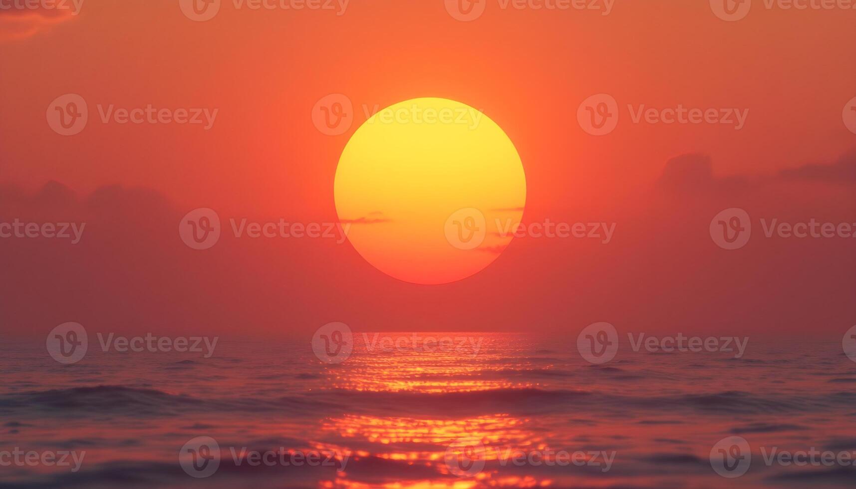 The sun is setting over the ocean photo
