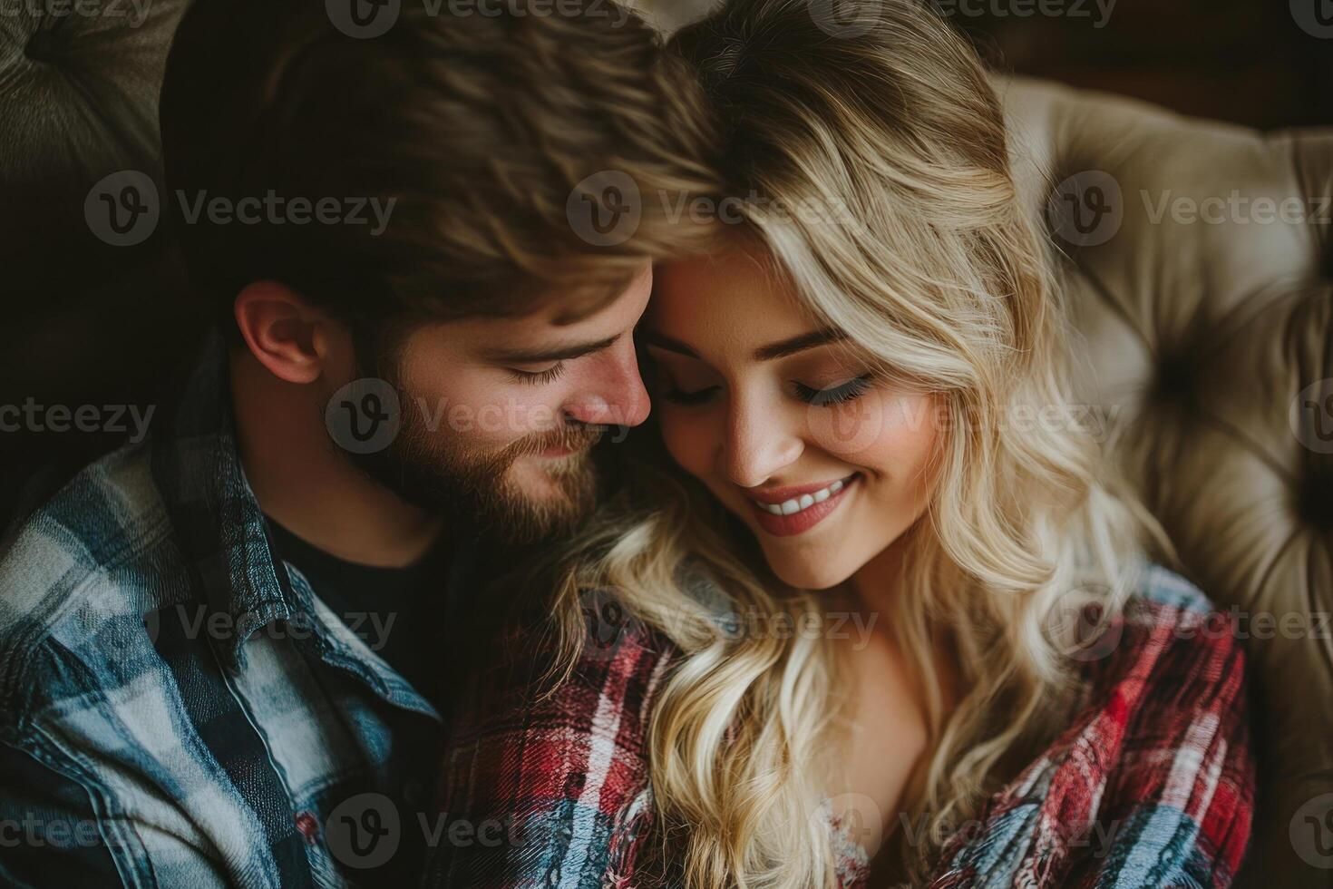 Couple enjoys a cozy moment together in a rustic setting with soft lighting photo