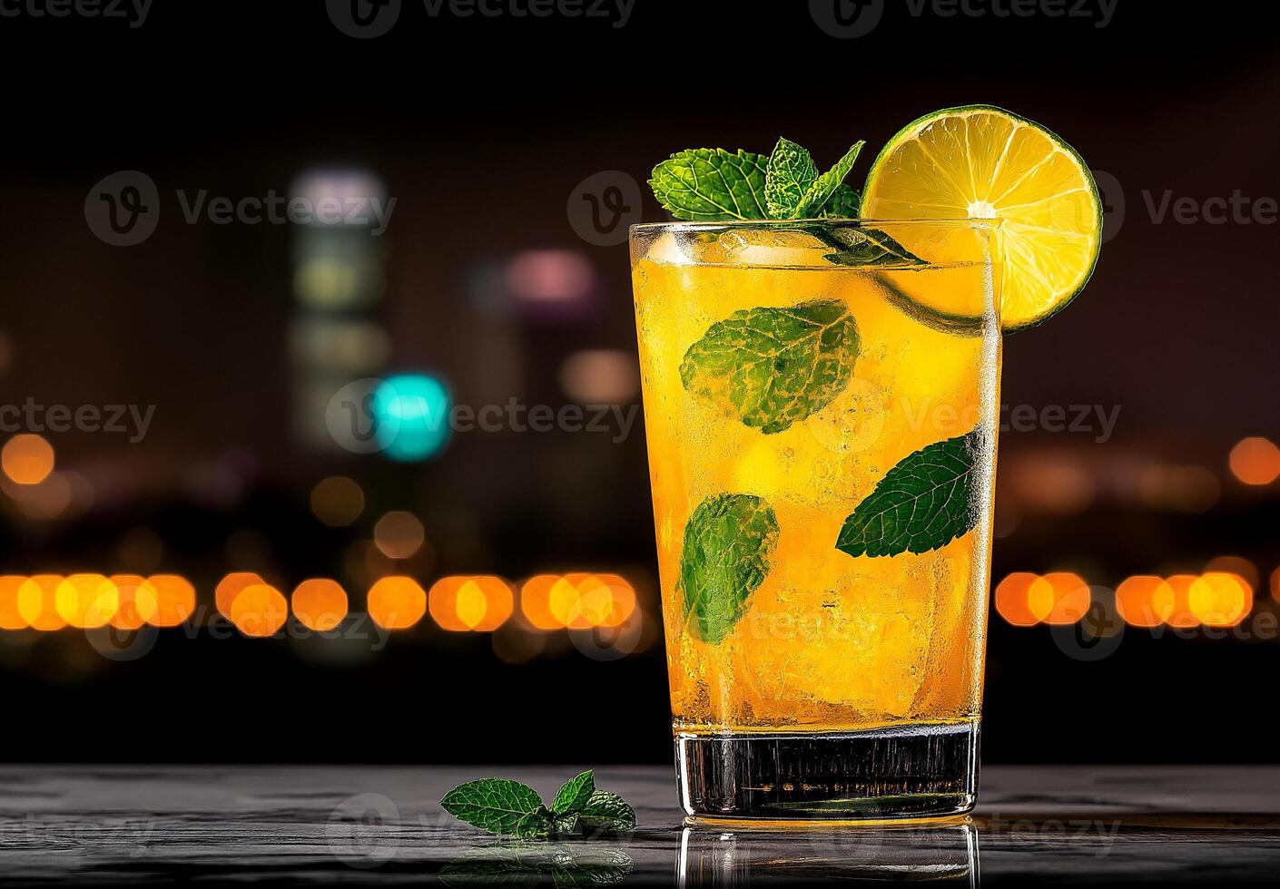 Refreshing yellow mojito cocktail with mint and lime on bar. vibrant drink contrasts beautifully against blurred city skyline at night, creating lively atmosphere photo