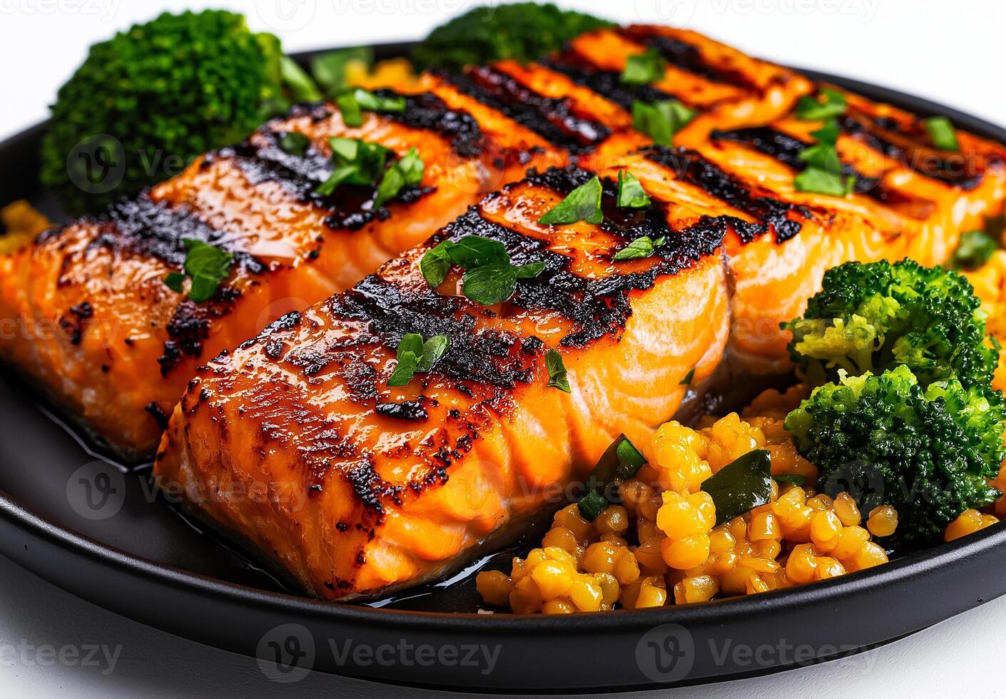 Delicious grilled salmon fillet served with steamed broccoli and grains, showcasing vibrant colors and mouthwatering presentation. Perfect for healthy meal photo