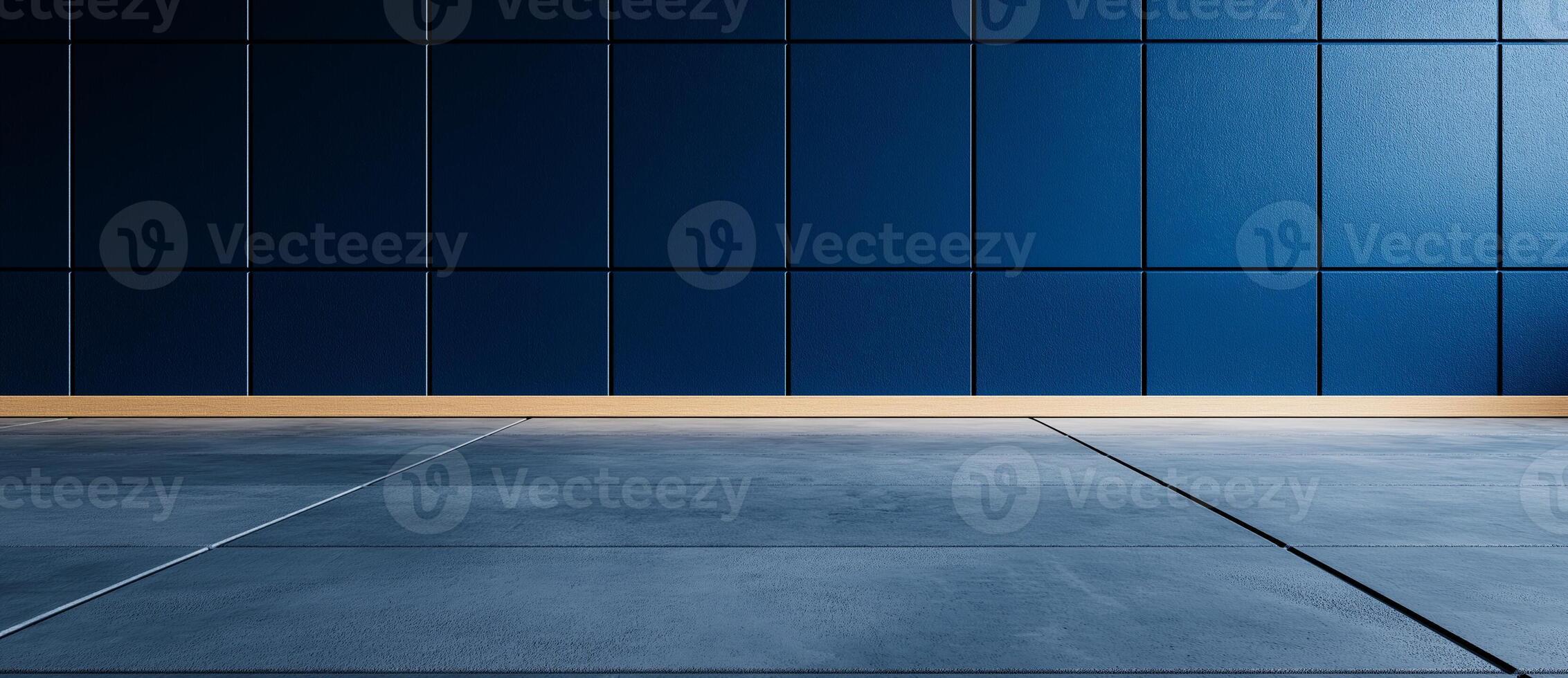 Modern empty room with blue concrete wall and gray asphalt floor. clean lines and minimalist design create calm and spacious atmosphere, perfect for various uses photo