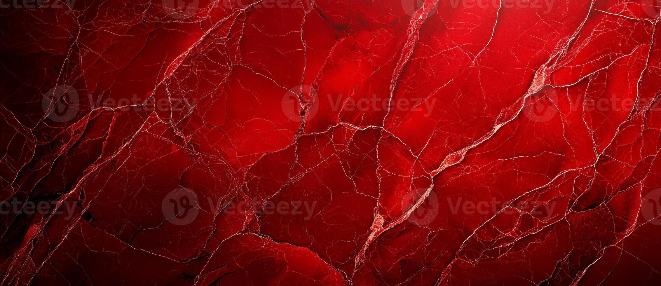 Red stone texture with cracks, resembling vibrant marble background. This striking surface showcases intricate patterns and deep hues, perfect for various design applications photo