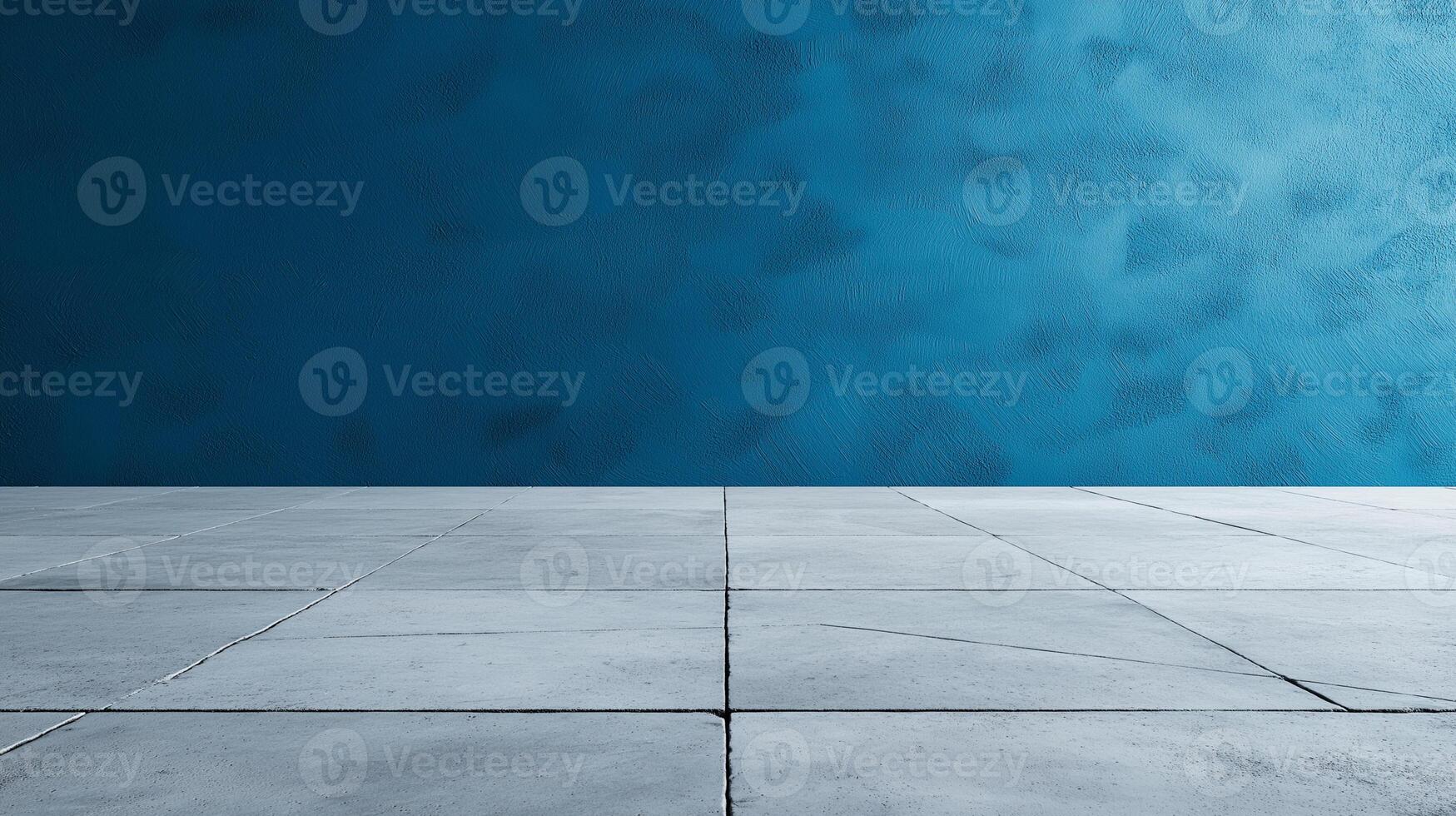 blank wall with textured blue surface and concrete floor creates modern, minimalist setting. This evokes sense of calm and simplicity, perfect for various design projects photo