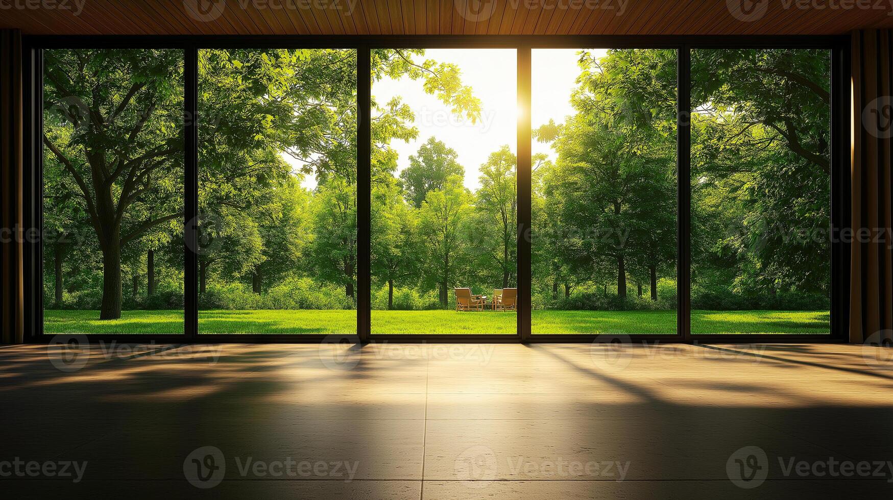 spacious interior with large windows showcasing lush green landscape. Sunlight filters through trees, creating serene and inviting atmosphere photo