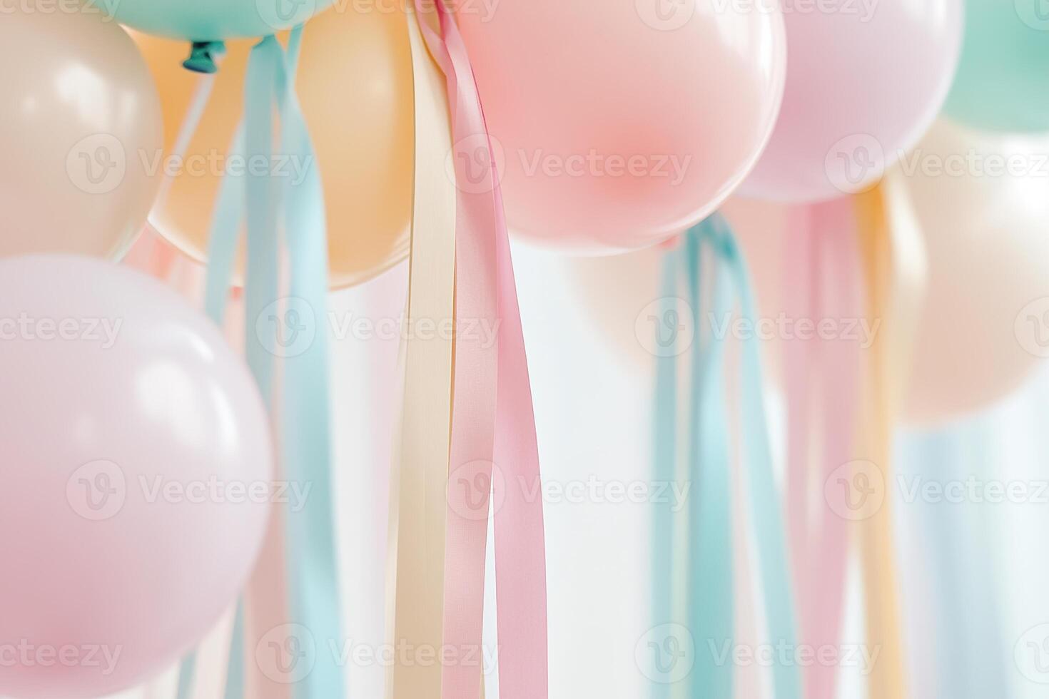 Bright and playful atmosphere fills the space, showcasing multicolored streamers overhead and softly blurred pastel balloons, perfect for a joyful children's celebration photo
